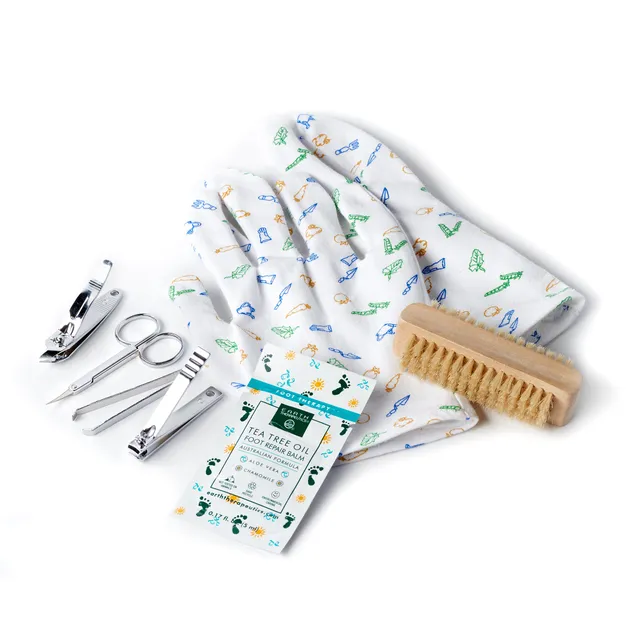 earth-therapeutics-mani-care-kit-moisturizing-gloves-nail-brush image 1
