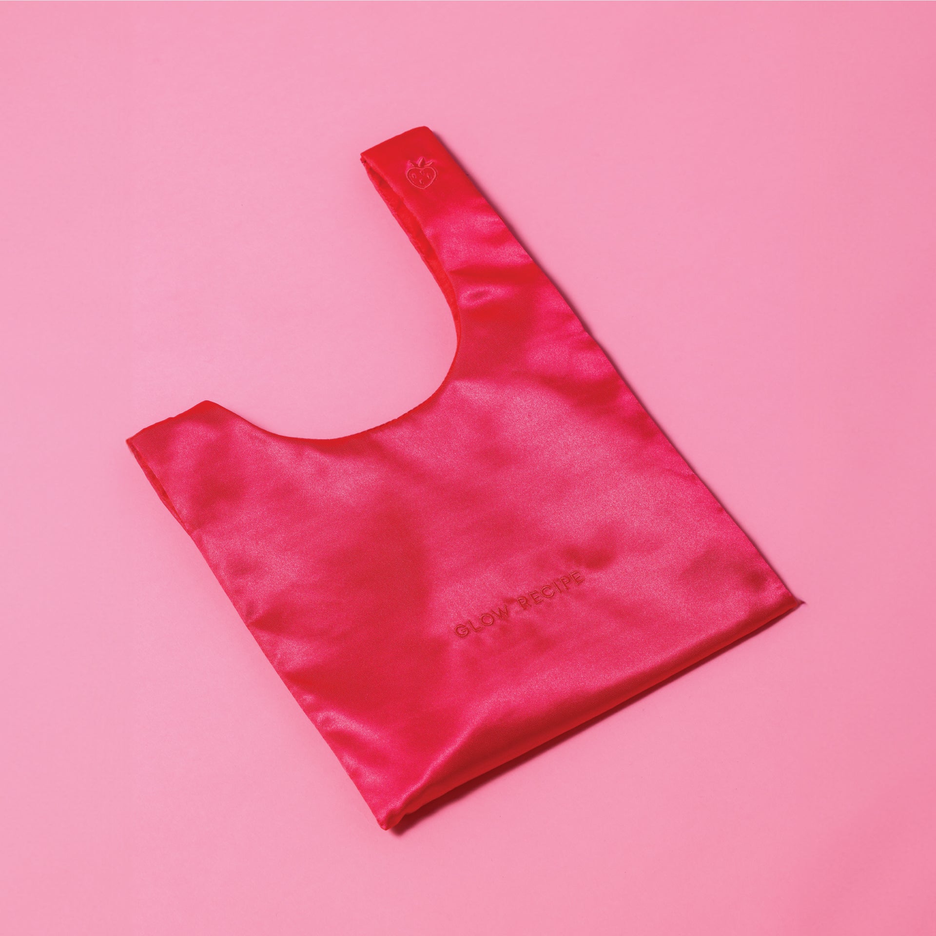 glow-recipe-strawberry-satin-knot-bag-embroidered-luxury-beauty-accessory image 2