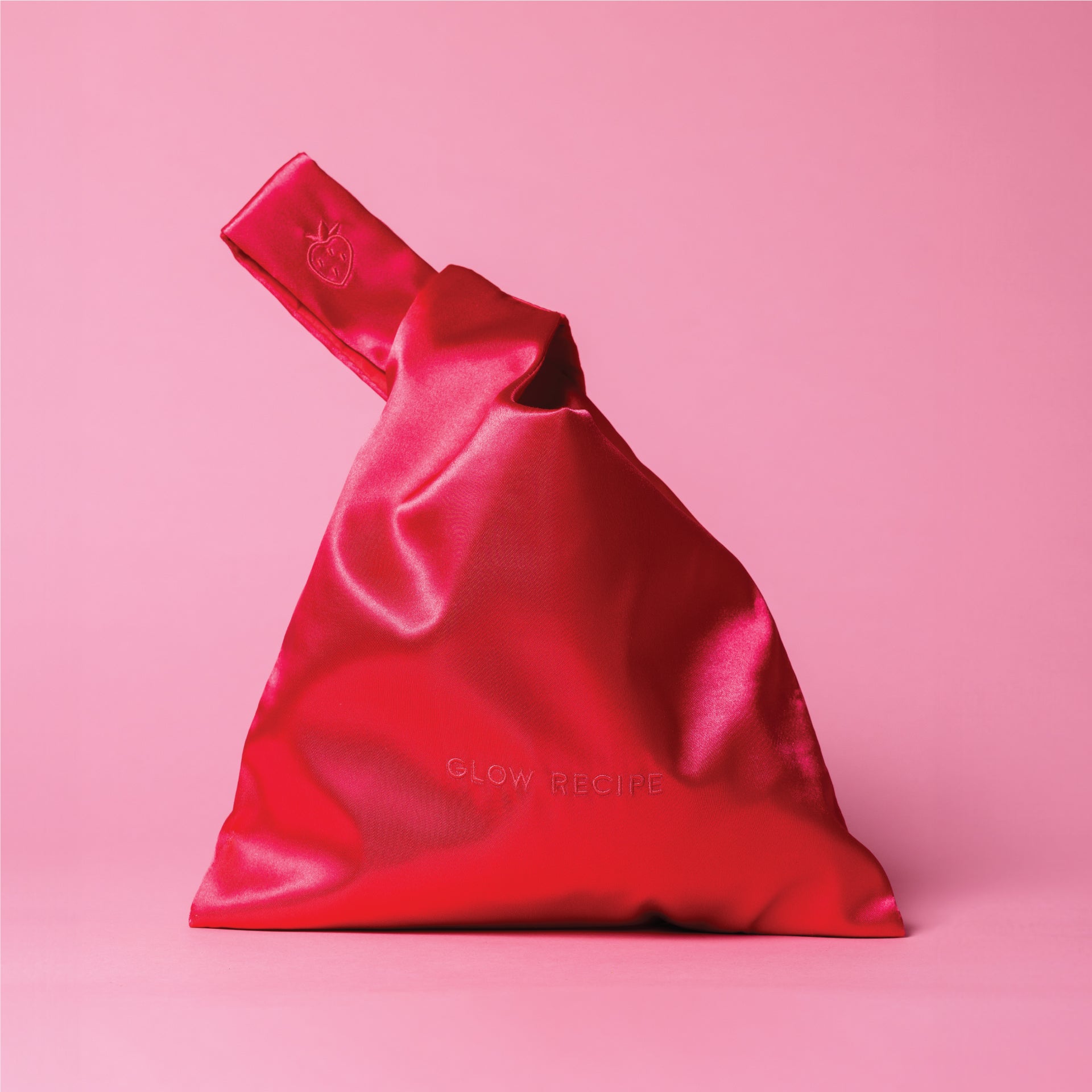 glow-recipe-strawberry-satin-knot-bag-embroidered-luxury-beauty-accessory image 1